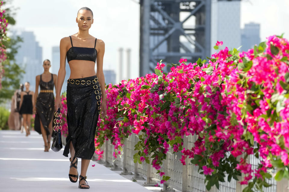 The Michael Kors collection is modeled during Fashion Week, Monday, Sept. 11, 2023, in New York. (AP Photo/Mary Altaffer)