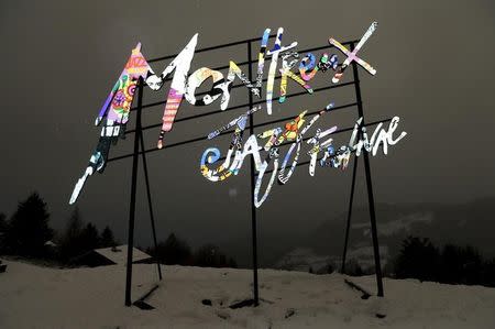 An art installation replicating the poster of the 2016 edition of the Montreux Jazz festival is pictured in the garden of Le Picotin chalet in Caux near Montreux, Switzerland, February 4, 2016. REUTERS/Denis Balibouse