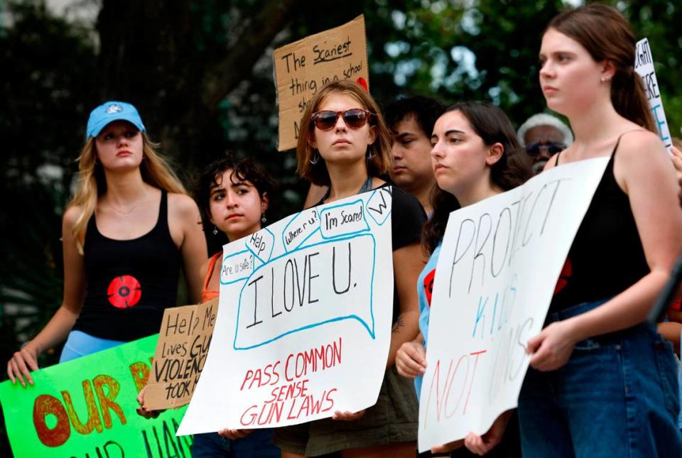 UNC sophomore Sasha Green, center, and other attend a protest against gun violence sponsored by March for Our Lives UNC-CH outside the Legislative building in Raleigh, N.C., Tuesday, Sept. 12, 2023.