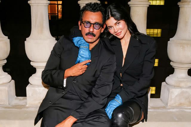 <p>Madison McGaw/BFA.com</p> Kylie Jenner poses with Haider Ackermann at a NYFW dinner event on Friday