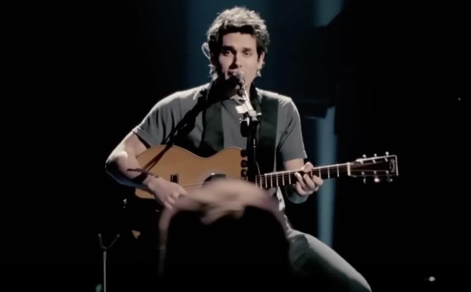 John Mayer playing guitar