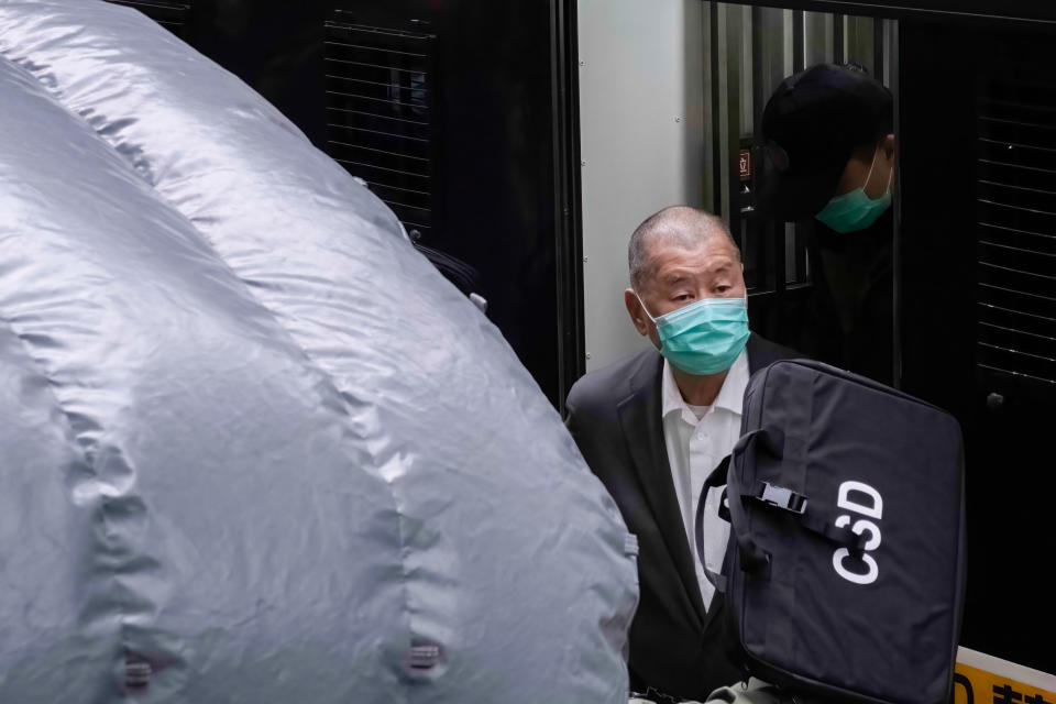 HONG KONG, CHINA - 2021/02/09: Media Tycoon Jimmy Lai Chi-ying steps out off an armored vehicle. (Photo by Perry Hui/SOPA Images/LightRocket via Getty Images)