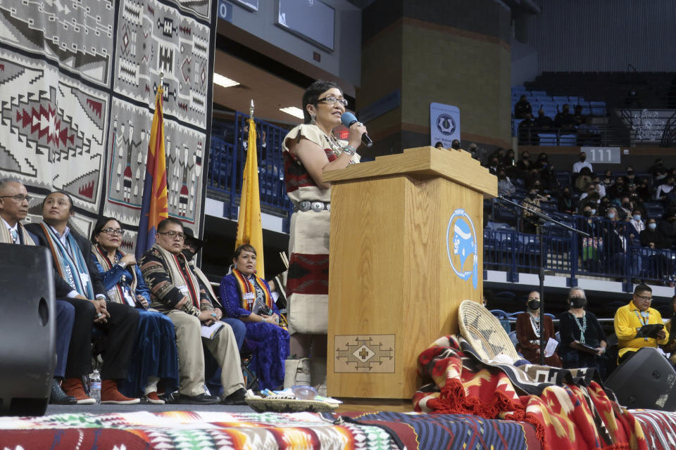 Navajo Nation Vice President Richelle Montoya addresses a crowd gathered for the tribe's inauguration on Tuesday Jan. 10, 203, in Fort Defiance, Ariz. Montoya is the first woman to hold the tribal vice presidency. President Buu Nygren is the youngest person elected to that position. (AP Photo/Felicia Fonseca)