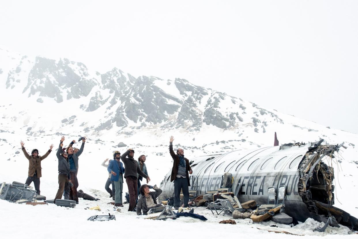 In this scene from "Society of the Snow," actors playing the survivors of an Uruguayan Air Force charter plane crash try to attract the attention of rescuers. The movie is Spain's entrant into Oscar's international film sweepstakes.
