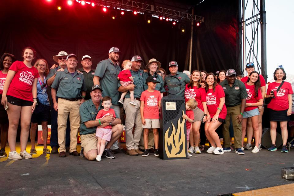 Big Bob Gibson's team members celebrate after they won first in the pork shoulder division at the 2024 World Championship Barbecue Cooking Contest as part of Memphis in May at Liberty Park on Saturday, May 18, 2024.