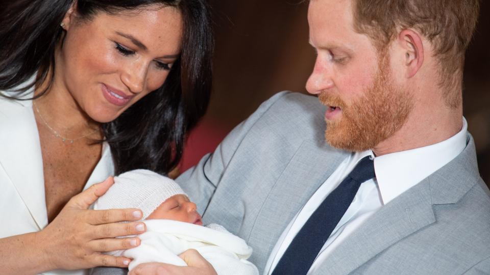 Prince Harry and Meghan Duchess of Sussex pose together with their newborn son Archie Harrison Mountbatten-Windsor in Windsor