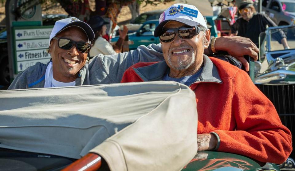 Nate Fearonce of Cambria, founder of the town’s Pinedorado car show, gets ready to ride in the event’s parade as its 2019 parade marshal. Accompanying him in one of Leland Powel’s antique cars is Andre Fearonce, the marshal’s son.