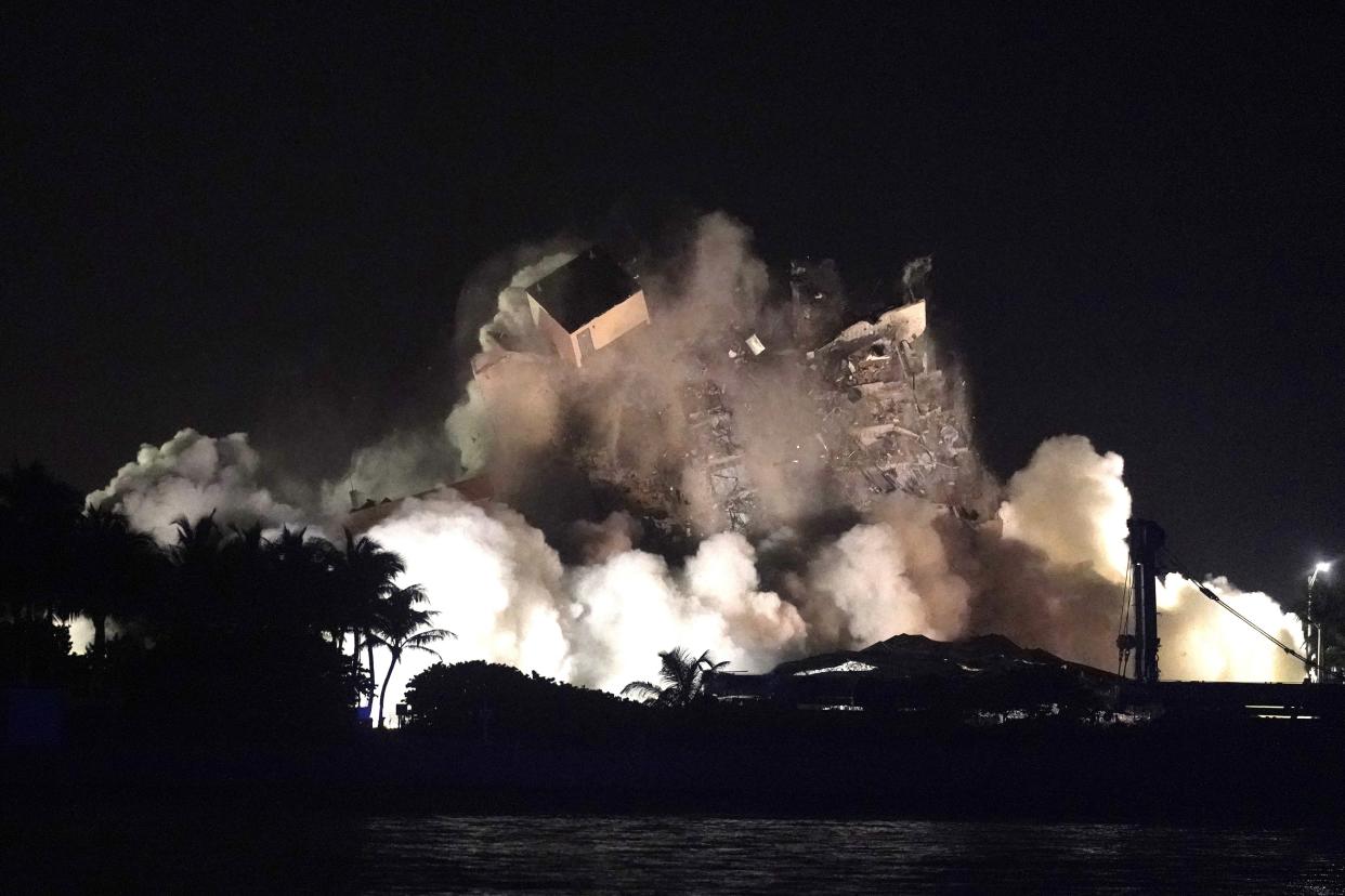 The remaining structure of the Champlain Towers South condo building is demolished more than a week after it partially collapsed, late Sunday, July 4, 2021, in Surfside, Fla.