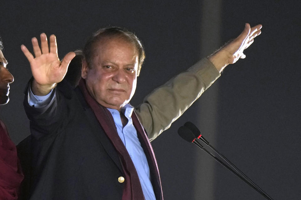 FILE - Pakistan's former Prime Minister Nawaz Sharif waves to his supporters upon his arrival to address a welcoming rally, in Lahore, Pakistan, Saturday, Oct. 21, 2023. A Pakistani court Tuesday, Dec. 12, overturned the 2018 conviction of former Prime Minister Sharif in a graft case and acquitted him, clearing his path to run in the parliamentary elections set to be held in February. (AP Photo/Anjum Naveed, File)