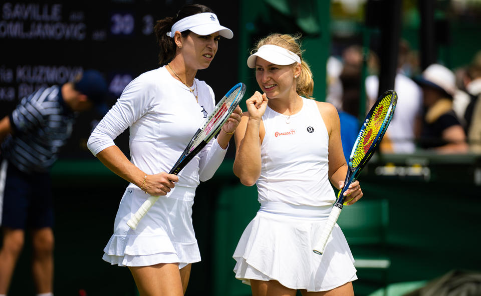 Ajla Tomljanovic and Daria Saville, pictured here at Wimbledon.