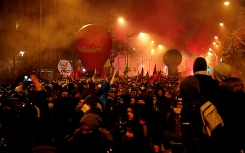 Protesters hold union flags during a demonstration to protest against the pension overhauls, in Paris, on December 5, 2019 a - Credit: &nbsp;ZAKARIA ABDELKAFI/AFP
