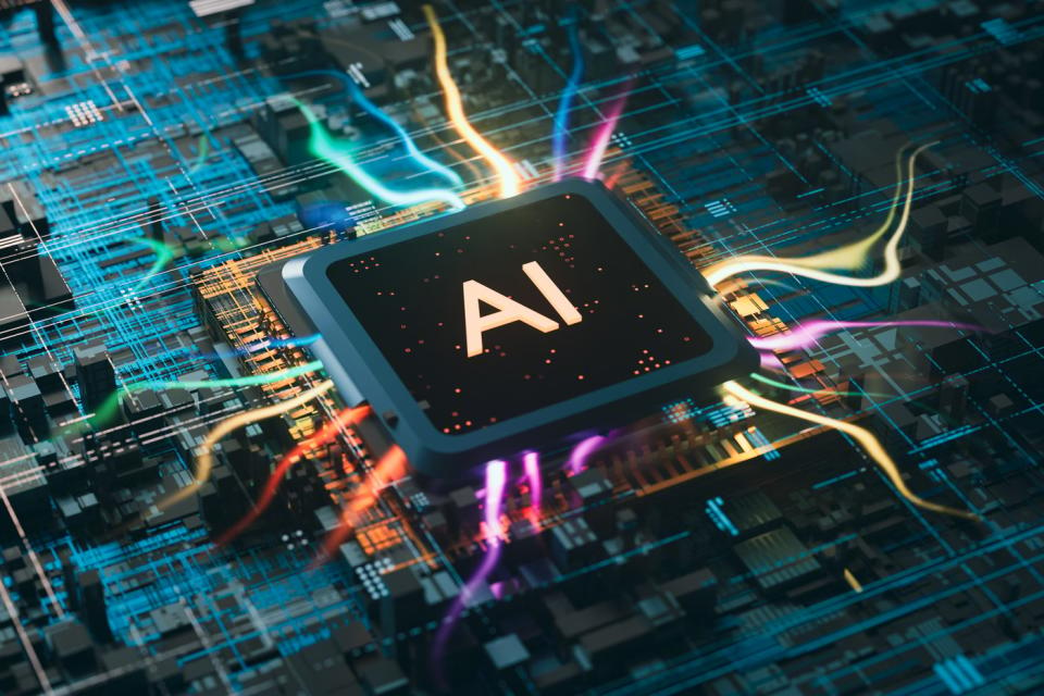 Computer chip with the word AI printed on it.