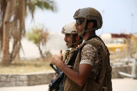 UAE soldiers stand guard at the international airport of the southern port city of Aden, Yemen August 6, 2015. Picture taken August 6, 2015. REUTERS/Fawaz Salman