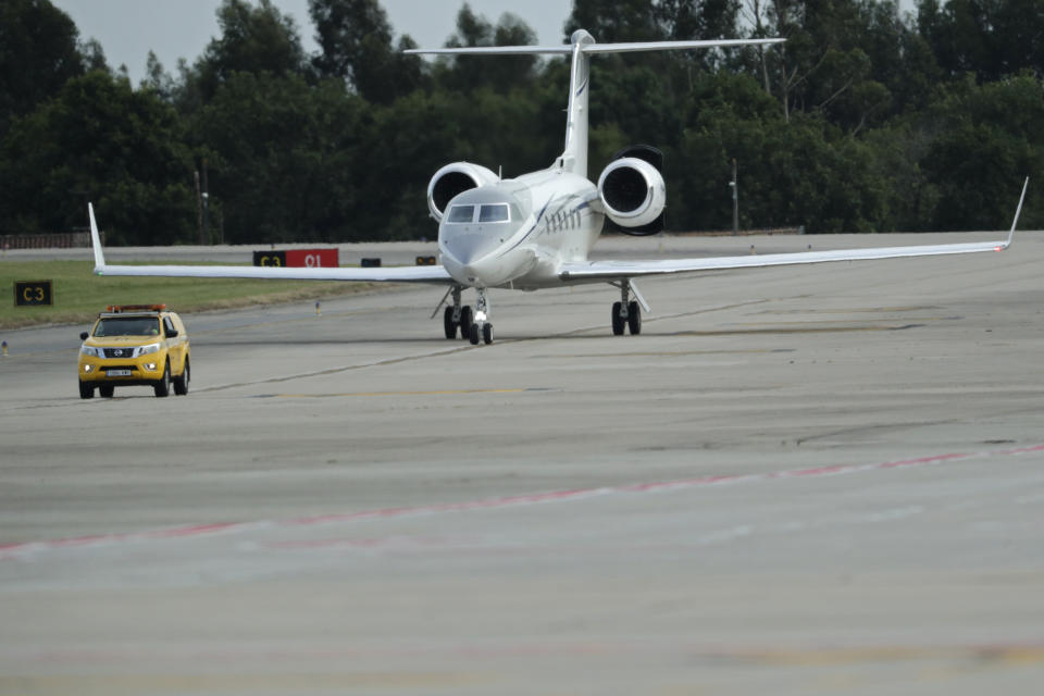 A private jet with Spain's former King Juan Carlos on board taxis after landing at the Peinador airport in Vigo, north western Spain, Thursday, May 19, 2022. Spain's former King has returned to Spain Thursday for his first visit since leaving nearly two years ago amid a cloud of financial scandals. (AP Photo/Lalo R. Villar)