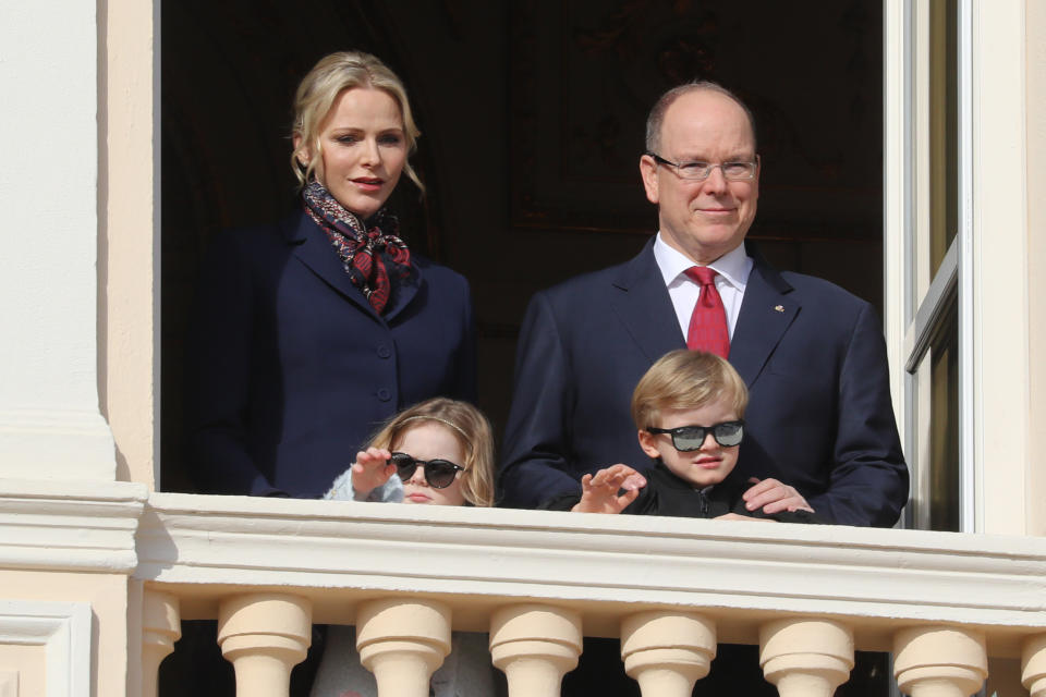 Prince Albert II of Monaco, Princess Charlene of Monaco, Prince Jacques and Princess Gabriella appear on the palace's balcony during Sainte Devote Celebrations in Monaco on January 27, 2020. - Saint Devote is the patron saint of the Grimaldi family, reigning in Monaco, and is celebrated each year as a national holiday. (Photo by VALERY HACHE / AFP) (Photo by VALERY HACHE/AFP via Getty Images)