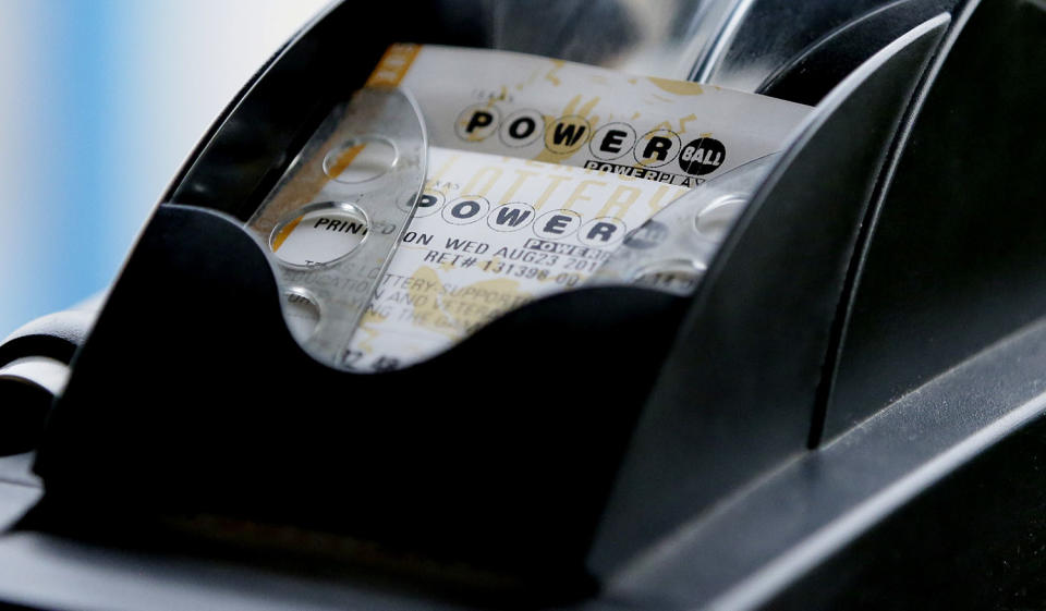 <p>A Powerball lottery ticket is printed on a lottery machine at a convenience store in Dallas, Aug. 23, 2017. Lottery officials said the grand prize for Wednesday night’s drawing has reached $700 million. The second -largest on record for any U.S. lottery game. (Photo: LM Otero/AP) </p>