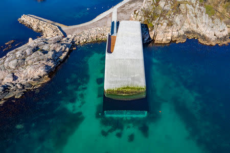 "Under", a semi-submerged restaurant beneath the waters of the North Atlantic which will be open to public on March 21, 2019 is pictured in Lindesnes, south west of Oslo, Norway March 19, 2019. Picture taken March 19, 2019. NTB Scanpix/Tor Erik Schroder via REUTERS