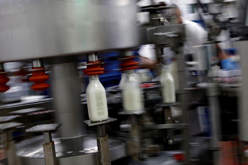 Bottles of milk are been processed at as coronavirus disease (COVID-19) continues to spread in Middletown, Maryland