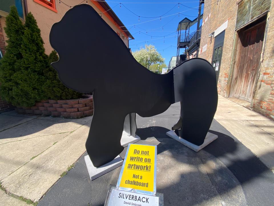 A sign has been added to the "Silverback" sculpture in downtown Tecumseh, pictured Thursday, warning people to not write on it.