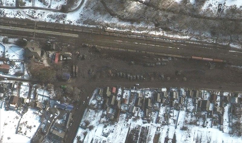 A satellite image shows armor and vehicles at a railyard, in Veselaya Lopan, Belgorod