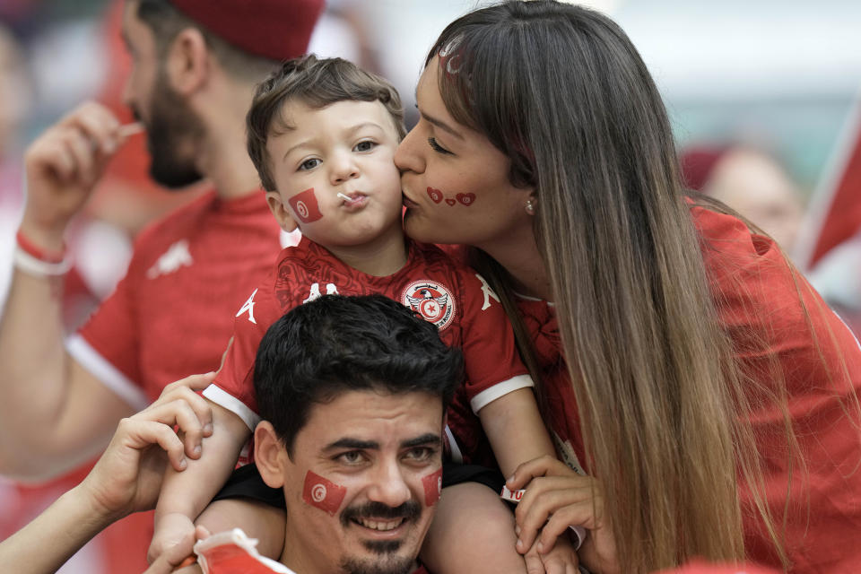 Soccer supporters await the start of the World Cup group D soccer match between Denmark and Tunisia, at the Education City Stadium in Al Rayyan , Qatar, Tuesday, Nov. 22, 2022. (AP Photo/Hassan Ammar)