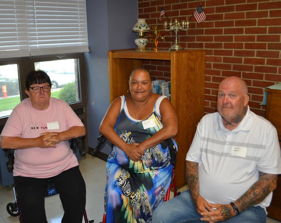 Anne-Marie Pacheco (center) and her fellow residents at the Newport Housing Authority's Donovan Manor were on hand for US Secretary of Commerce Gina Raimondo's remarks about broadband internet infrastructure funding on Friday, June 30 2023. They say the internet upgrades at Donovan Manor were life-changing.