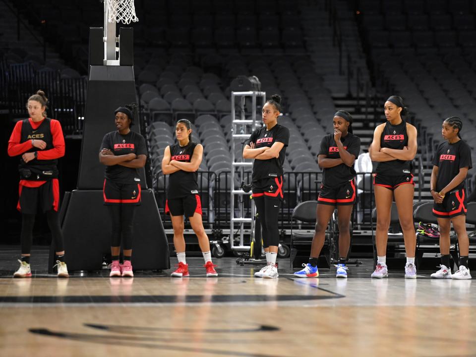 Las Vegas Aces teammates Kelsey Plum (left) and Dearica Hamby.