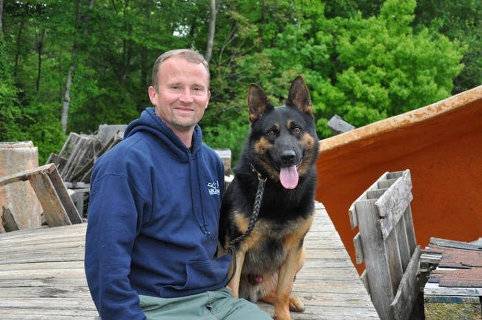 Dog trainer Jason Pergason with Rebel, a German shepherd he trained for a search team in Ireland