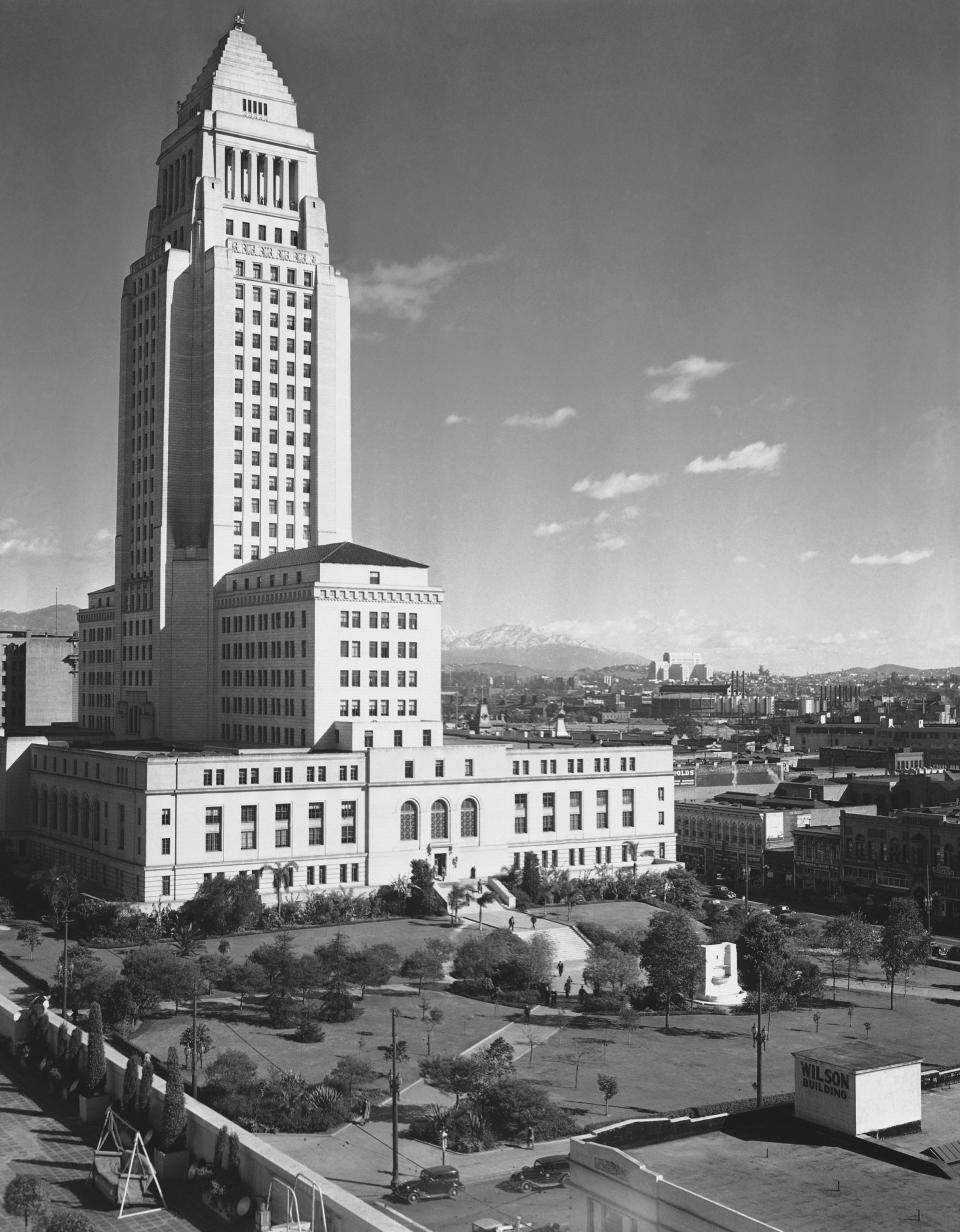 FILE - Los Angeles City Hall dominates the low skyline in Los Angeles on Aug. 29, 1946. The building is shown in the Emmy-nominated HBO drama series, "Perry Mason," based on Erle Stanley Gardner’s books and a prequel of sorts to the long-running 1950s show starring Raymond Burr, where 1930s Los Angeles is itself a star through the creators’ use of iconic institutions, public landmarks, terrain — and racial and class divisions. (AP Photo/Dan Grossi, File)