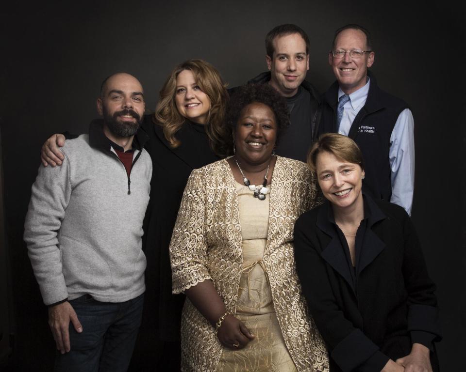 Director Pedro Kos, from left, producer Cori Stern, Dr. Agnes Binagwaho, Director Kief Davidson, Dr. Paul Farmer and Ophelia Dahl pose for a portrait to promote the film, "Bending the Arc", at the Music Lodge during the Sundance Film Festival on Sunday, Jan. 22, 2017, in Park City, Utah. (Photo by Taylor Jewell/Invision/AP)