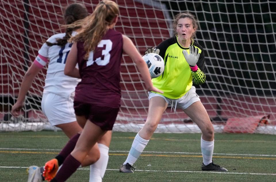 South Kingstown goalie Abby O'Rourke, right, made 13 saves as the Rebels blanked North Kingstown, 1-0, in girls soccer on Monday.