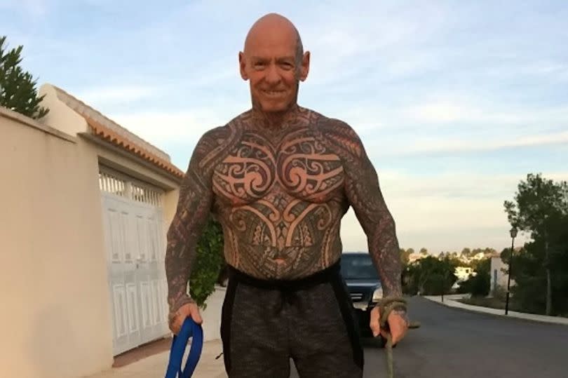 Ray says his whole body is covered in tattoos -Credit:Ray Houghton /SWNS.COM