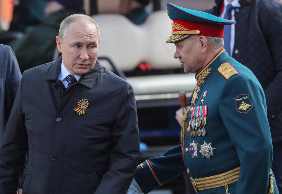 Russian president Vladimir Putin (L) with defence minister Sergei Shoigu (EPA)