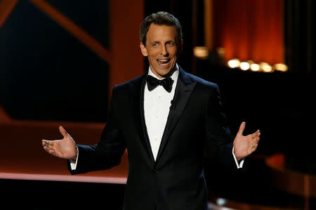 FILE PHOTO: Host Seth Meyers speaks onstage during the 66th Primetime Emmy Awards in Los Angeles, California, U.S., August 25, 2014. REUTERS/Mario Anzuoni/File Photo