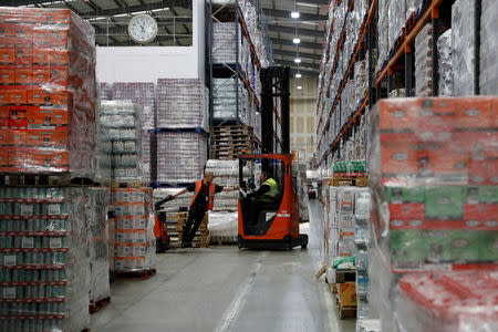 Men work at Grace Foods UK distribution centre in Welwyn Garden City, Britain September 25, 2017. Picture taken September 25, 2017. To match Insight BRITAIN-EU/COMPANIES REUTERS/Darren Staples