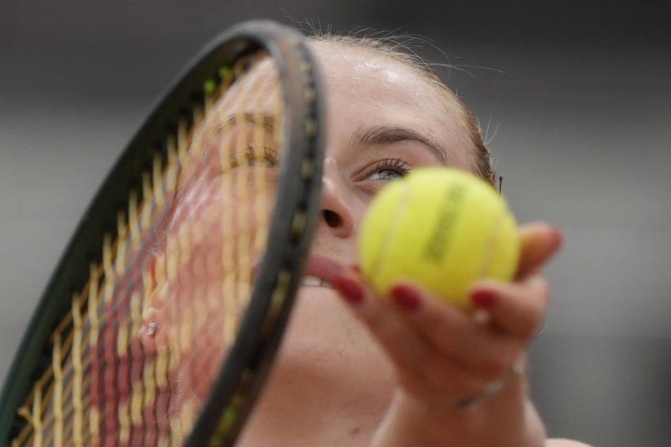 Ukraine's Marta Kostyuk serves the ball to Japan's Naomi Osaka at the Italian Open tennis tournament, in Rome, Thursday, May 9, 2024. (AP Photo/Andrew Medichini)