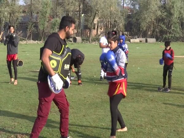 Wushu coach Rameez Ahmad training students 