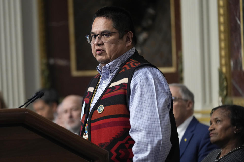 Chair Jonathan W. Smith, Sr., of the Confederated Tribes of the Warm Springs Reservation speaks during a signing ceremony in Washington, Friday, Feb. 23, 2024. The ceremonial signing is an agreement between the Biden administration and state and Tribal governments to work together to protect salmon and other native fish, honor obligations to Tribal nations, and recognize the important services the Columbia River System provides to the economy of the Pacific Northwest. (AP Photo/Susan Walsh)