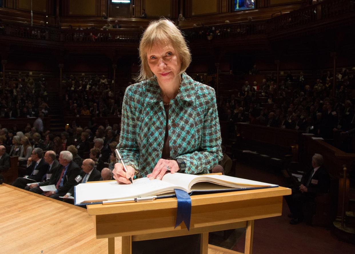 Diana H. Wall, University Distinguished Professor; Director, School of Global Environmental Sustainability; Senior Research Scientist, Natural Resource Ecology Laboratory; Professor of Biology at Colorado State University, signs the American Academy of Arts and Sciences’ Book of Members, a tradition that dates back to 1780.

Photo courtesy American Academy of Arts and Sciences