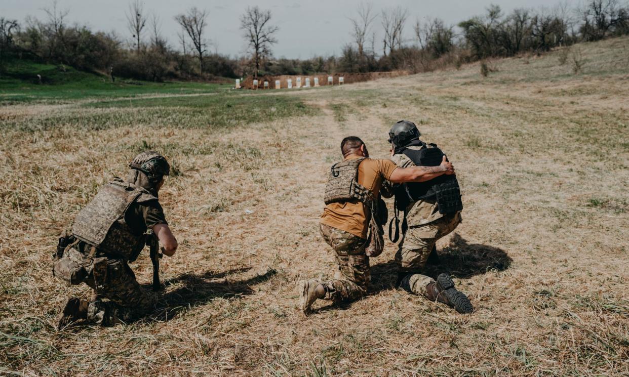 <span>Soldiers training in Donetsk Oblast, Ukraine.</span><span>Photograph: Anadolu/Getty Images</span>