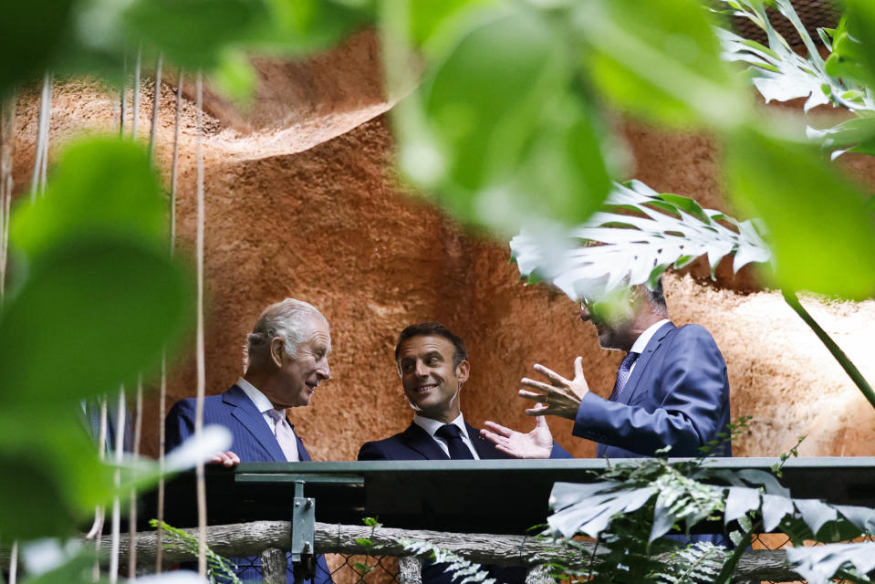 French President Emmanuel Macron and Britain's King Charles III, left, visit the Jardin des Plantes' tropical greenhouse during their visit to the Museum of Natural History to meet business leaders and talk about biodiversity, in Paris, Thursday, Sept. 21, 2023. Britain's King Charles III and Queen Camilla are on a three-day state visit to Paris and Bordeaux. (Ludovic Marin, Pool via AP)