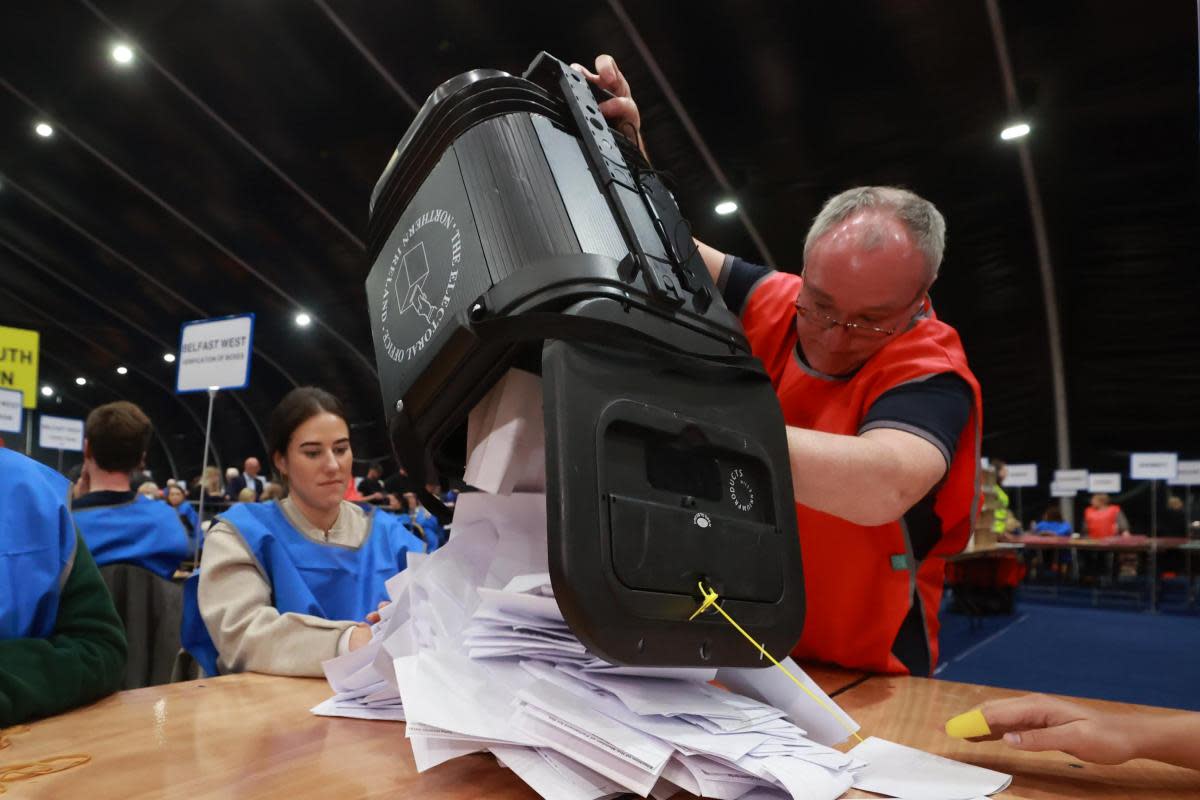 A ballot box is emptied at the Titanic Exhibition Centre, Belfast <i>(Image: PA)</i>