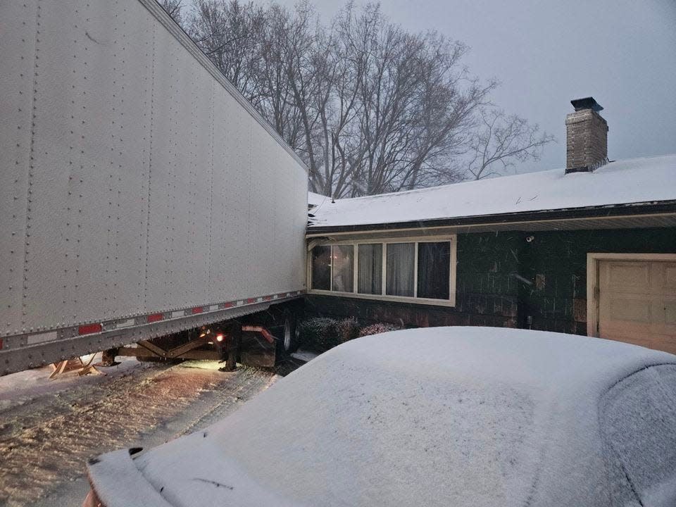 A tractor-trailer crashed into a house on South Clinton Avenue near Brighton Henrietta Townline Road on March 20, 2024 after it was involved in a crash on Interstate 390 nearby and exited the highway.