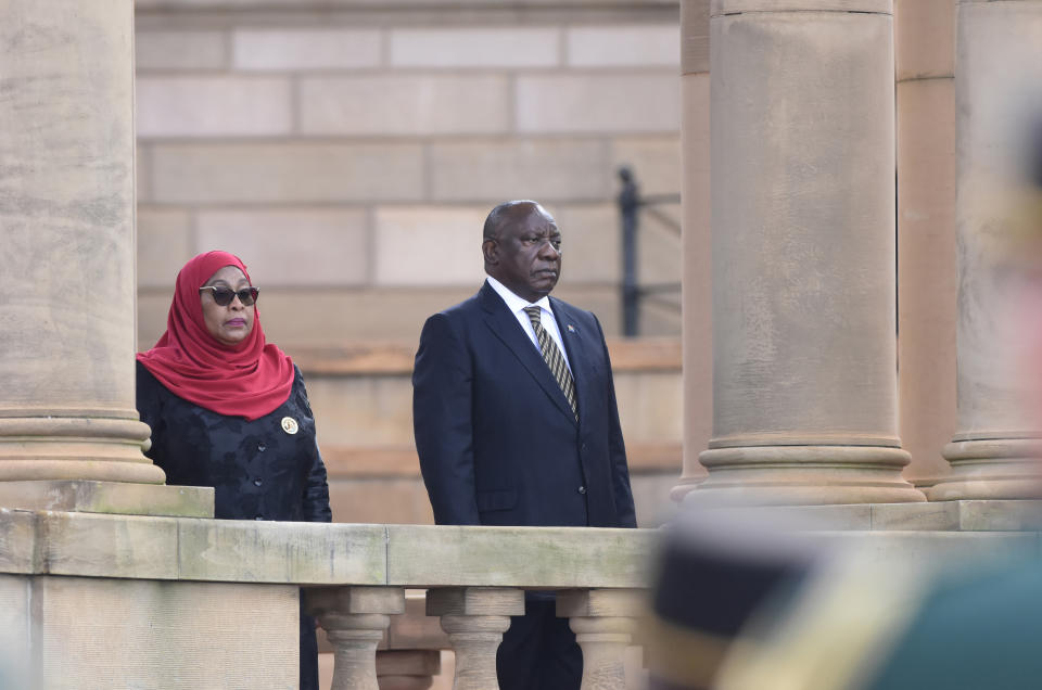 Tanzanian President Samia Suluhu Hassan and her South African counterpart Cyril Ramaphosa at a welcoming ceremony in Pretoria, South Africa, Thursday, March 16, 2023. Hassan, on a state visit to the country, has urged more security cooperation and trade between the two countries.(AP Photo/Frans Sello waga Machate)