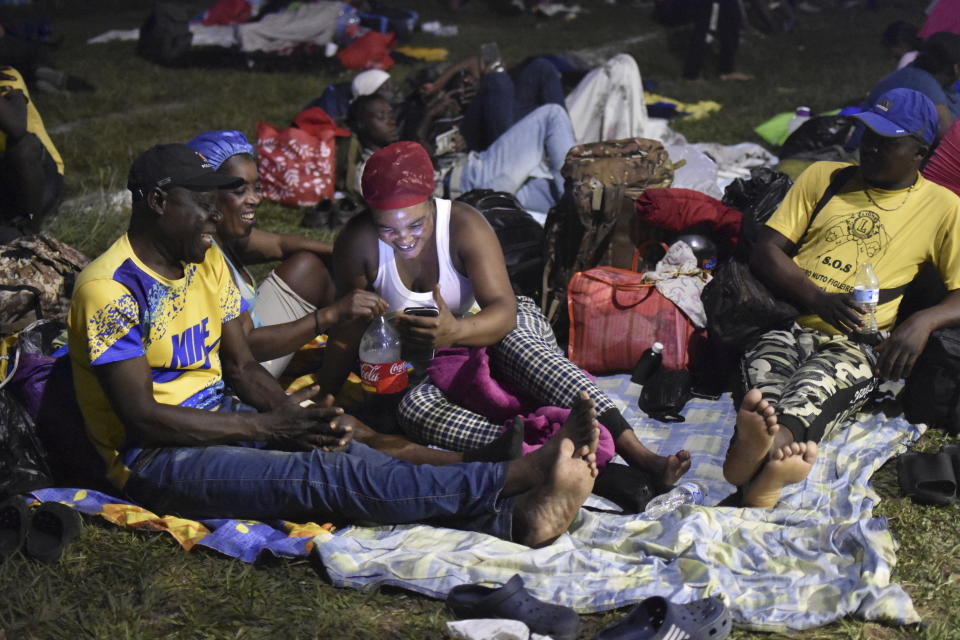 Migrants camp in Alvaro Obregon, Mexico, Sunday, Dec. 24, 2023. A caravan or migrants started the trek north from Tapachula on Sunday, just days before U.S. Secretary of State Antony Blinken arrives in Mexico City to discuss new agreements to control the surge of migrants seeking entry into the United States. (AP Photo/Edgar H. Clemente)