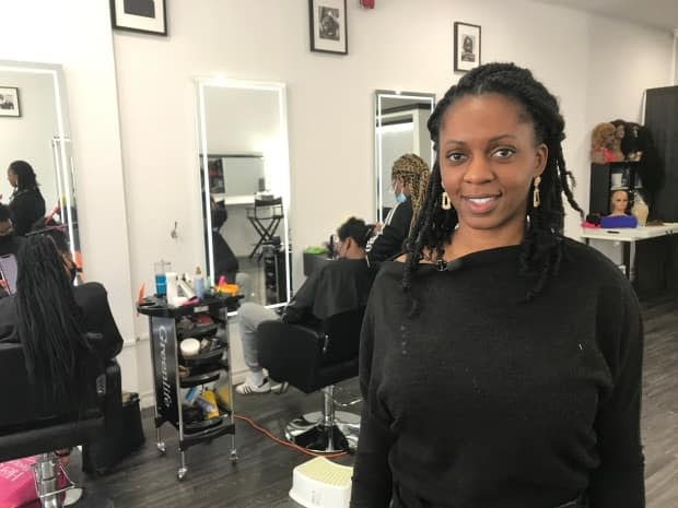 Stéphanie Odia, owner of a salon in southwestern Montreal, says police need to take racial profiling more seriously. (Hugo Lalonde/CBC - image credit)