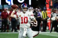 Oct 22, 2018; Atlanta, GA, USA; New York Giants quarterback Eli Manning (10) attempts a pass in the first quarter against the Atlanta Falcons at Mercedes-Benz Stadium. Mandatory Credit: Jason Getz-USA TODAY Sports