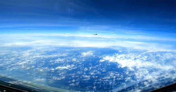 PHOTO: A People's Republic of China J-16 fighter pilot performs a maneuver during the intercept of a U.S. Air Force RC-135 aircraft over the South China Sea, May 26, 2023. (USAF)