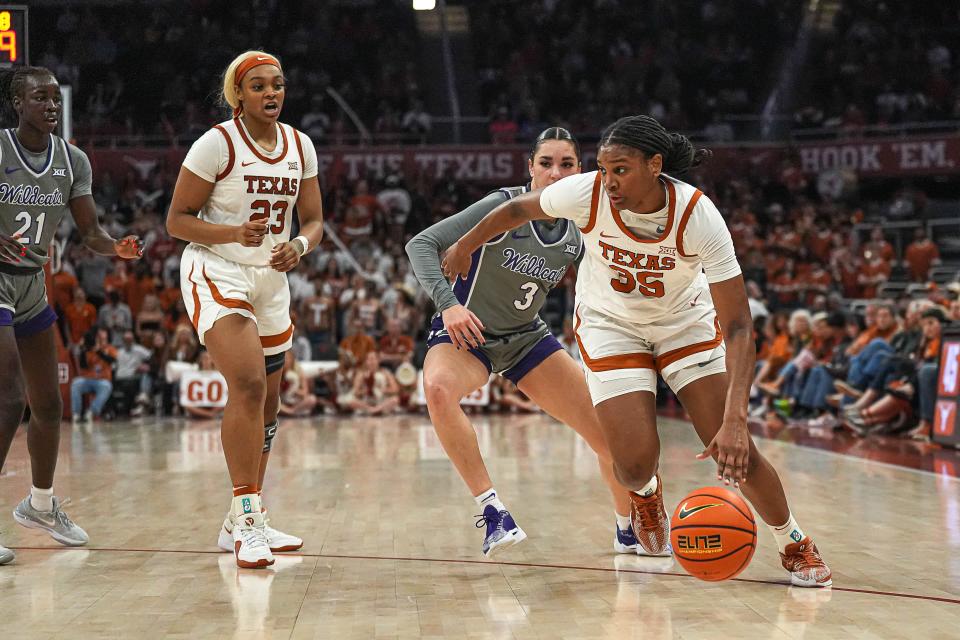 Texas guard Madison Booker dribbles toward the basket during Sunday's 61-54 win over No. 2 Kansas State at Moody Center. The freshman finished with 20 points to lead all scorers.