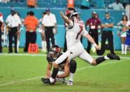 Aug 9, 2018; Miami Gardens, FL, USA; Tampa Bay Buccaneers kicker Chandler Catanzaro (7) kicks the game winning field goal during the second half against the Miami Dolphins at Hard Rock Stadium. Jasen Vinlove-USA TODAY Sports